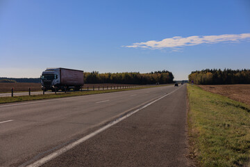 Autumn landscape, road and highway, asphalt and roadside.