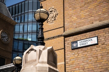 Street name sign for Liverpool Street, EC2, City of London, mounted on a wall in the financial district.