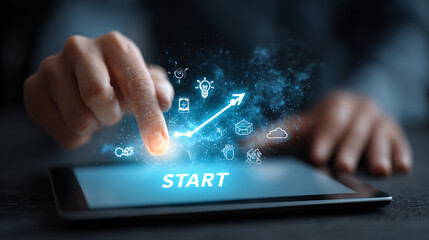Finger touching tablet displaying start button and glowing digital icons technology