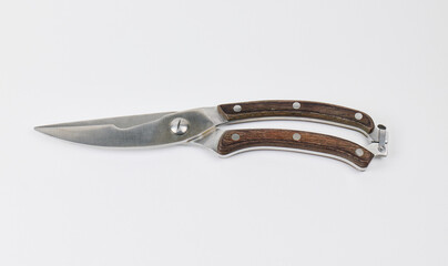stainless steel shears with wooden handles isolated