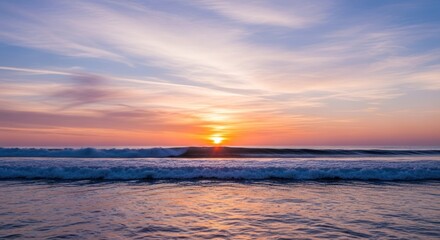 Obraz premium Coastal sunrise with vibrant colors and waves