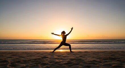 Silhouette of woman in yoga pose at sunset beach