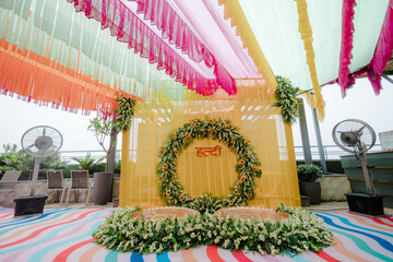 Haldi Decoration Ideas | Traditional Floral Setup, Marigold Haldi Decor, Wedding Haldi Stage, Yellow Theme, Bride & Groom Ritual Backdrop, Mehndi & Haldi Function