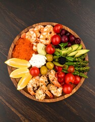 Colorful seafood platter with fresh vegetables