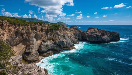 Obraz premium Rocky Coastline with Turquoise Sea