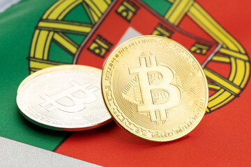 Bitcoin cryptocurrency coins on national flag of Portugal. Crypto law regulation concept