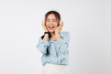 Fototapeta premium Music flows as happy woman closes eyes and smiles while listening through headphones, enjoying lifestyle peace and connection with calming music. isolated studio white background