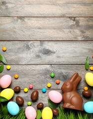 Easter candies on wooden background