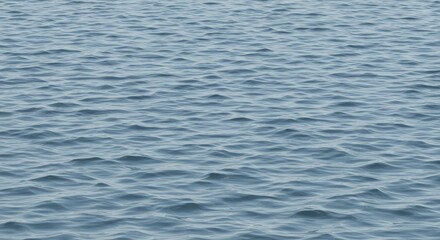 Obraz premium Serene Blue Water Ripples: Calm Ocean Surface Texture, Tranquil Aquatic Landscape
