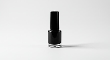 Obraz premium Sleek Black Nail Polish Bottle on White Background, Minimalist Beauty Concept.