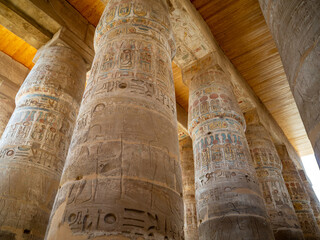 The Great Hypostyle Hall of Karnak Temple, showcasing rows of massive columns intricately decorated...