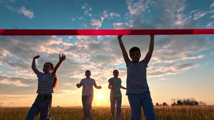 Children boy girl run to finish line in sunshine in park. Small children run to finish line. Victory success. Active children run. Sports child is champion. Boy is winner. Happy child runs across lawn - Powered by Adobe