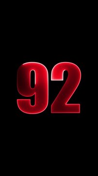 Glossy red numeral 92 with illuminated border on black background ninety two number