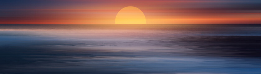 Obraz premium Seascape with neon sunset, ocean waves and rocks.