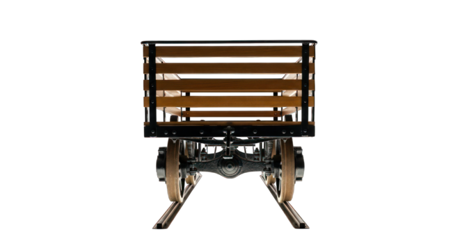 Rear of a vintage wooden wagon with metal frame and wheels, against black