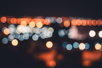 Fototapeta premium Bokeh of City Lights Behind the Night Window Glass