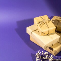 Gift boxes stacked on purple background