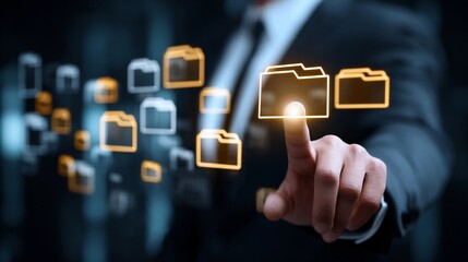 Business professional navigating digital file management through interactive display of folders in an office environment during evening hours