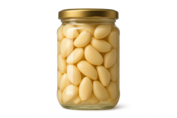 Preserved garlic cloves filling a glass jar with gold lid on transparent background
