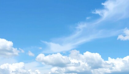 Fototapeta premium A vast expanse of a clear, vibrant blue sky is dotted with fluffy, white cumulus clouds.