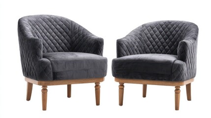Premium photo of two traditional quilted armchairs in gray velvet with wooden legs, isolated against a white background with clipping path. Furniture lineup.