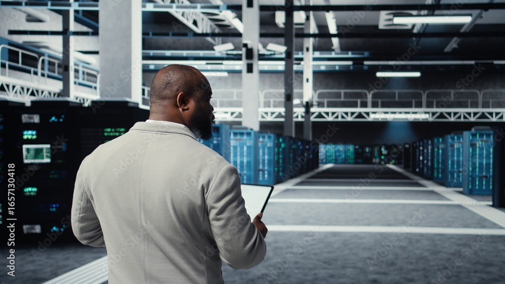 Aufkleber admin walking in high tech data center facility, checking equipment for system stability. it special