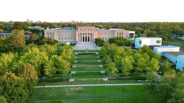 flyover of old building surrounded by trees
