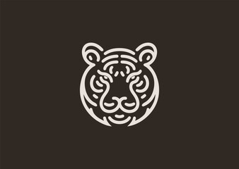 A sharp minimalist tiger head logo in clean line art, representing courage, strength, and focus.