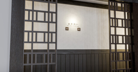 お手洗いと日本語の案内表示があるトイレの入り口のイメージ
