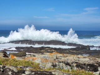 waves crashing on rocks