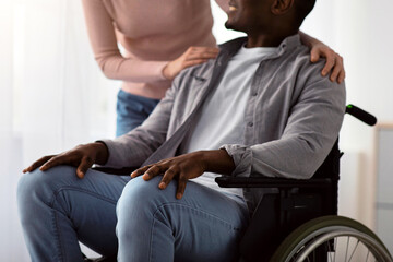 Caring for disabled patient at home or good relationships in multiracial family. Happy caucasian...