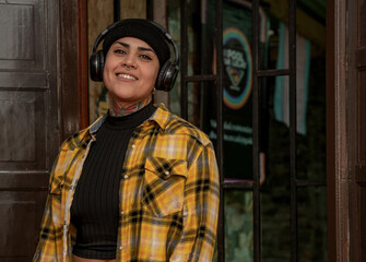portrait of a woman in a hat looking at camera