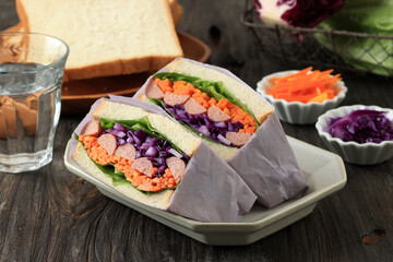 Japanese Wanpaku Sandwich with Sausage, Lettuce, Red Cabbage, and Carrot