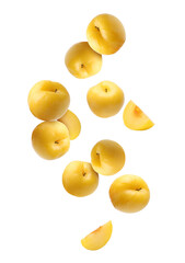 Fresh ripe cherry plums falling on white background