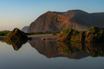 Barriga beach at sunset in the Sudoeste Alentejano and Vicentina coast Natural Park. Vila do Bispo,...
