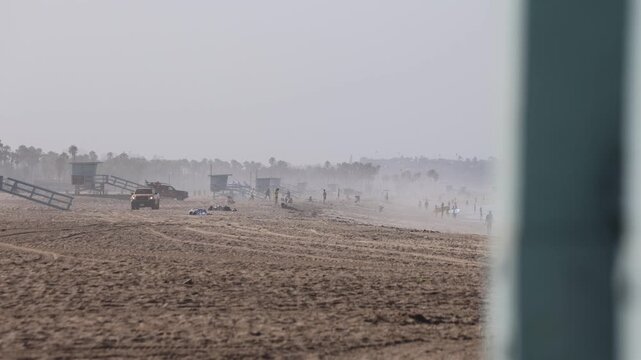 Hazy Santa Monica Beach With Lifeguard Truck Passing