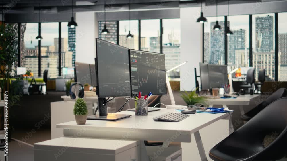 Poster stock market metrics graphs displayed on computer screens in investment firm office. workstation in 