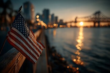 Naklejka premium American Flag on Wooden Railing with City Skyline and Sunset Over Water at Dusk United States