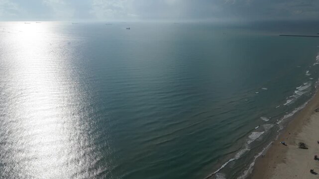 Aerial ocean view with ships on the horizon heading to the Port of Tuxpan, Veracruz, Mexico, 4K