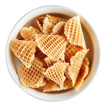 Waffle Cones Broken, Scattered in a Ceramic Bowl, at Kitchen Table.