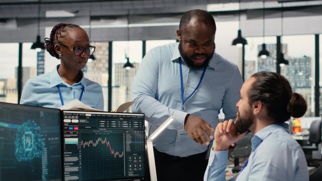Teamworking traders in prop firm office leverage AI tech to interpret charts, optimizing buying and selling. Brokerage coworkers doing brainstorming, using deep learning to maximize profits, camera B