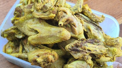 Freshly seasoned chicken ready to fry, delicious authentic Indonesian fried chicken.
