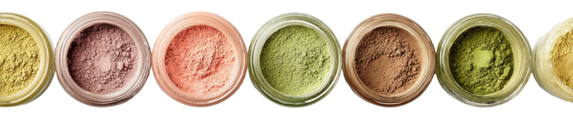 Round containers filled with various colored powder makeup