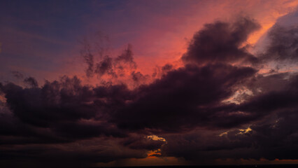 Fototapeta premium colorful dramatic sky with purple red golden cloud at sunset blue sky