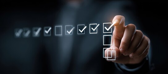 Hand virtually checking items off a digital checklist