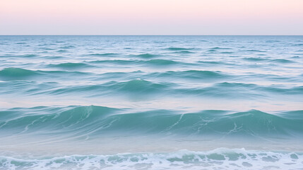 serene ocean view with soft green seafoam waves blending into pastel gradient sky of pink and blue, evoking tranquility and calmness