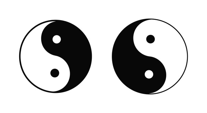 Yin yang symbols in black and white on a plain background