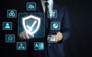 An IT specialist using a smartphone configures cloud-based security solutions for compliance with...