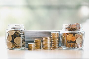 Finance and banking, saving coins, cash, gold while making smart investments in business, currency...