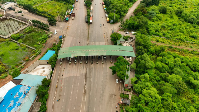 aerial view of highway toll plaza, drone shot of indian toll gate, expressway toll collection point, transport infrastructure on highway stock photo.	
